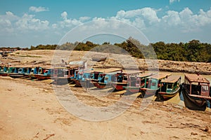 Floating Village Boats on the river in Cambodia near Pean Bang and Tonle Sap Lake