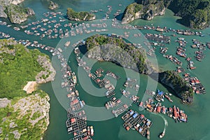 Floating Village on Ha Long Bay, Cat Ba Island, Vietnam, descending dragon bay Asia Aerial Drone Photo