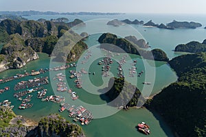 Floating Village on Ha Long Bay, Cat Ba Island, Vietnam, descending dragon bay Asia Aerial Drone Photo