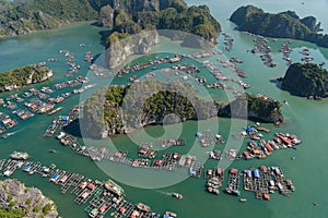 Floating Village on Ha Long Bay, Cat Ba Island, Vietnam, descending dragon bay Asia Aerial Drone Photo