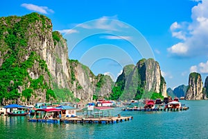 Floating village and rock islands in Halong Bay