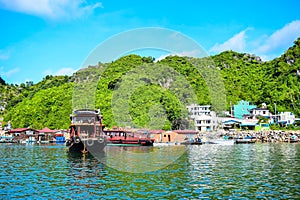 Floating village and rock islands in Halong Bay, Vietnam, Southeast Asia