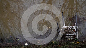 plastic chair lies in water, background image photo