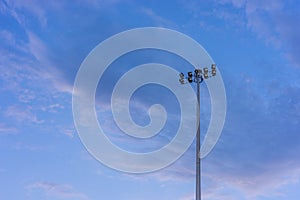 Flood light tower with blue sky