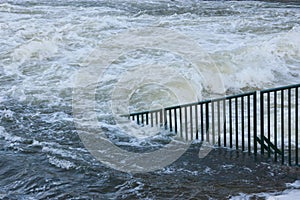 Flood water raging away