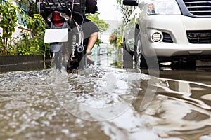 Flooded car vehicles after heavy rain,street in the alley were covered with a large amount of water,drainage problems,traffic