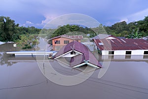 Flooded houses in rainy season.