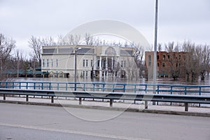 Flooded houses on the riverbank during the spring flood.