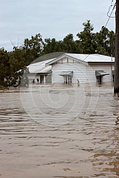 Flooded Insurance House Vertical