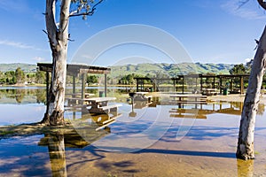Flooded meadow and picnic tables, Cunningham Lake, San Jose, south San Francisco bay, California