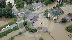 Flooded neighborhood street. Flooding leaves city, underwater, entire community