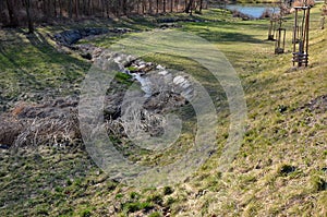 Flooded stream led to a narrow riverbed where the water drains quickly, the bends must be laid out with a stone so that water ero