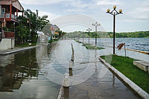 Flooded street along lake Itza at the island Flores, Guatemala