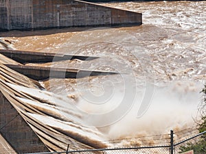 Floodgates open at an electrical power generation dam photo