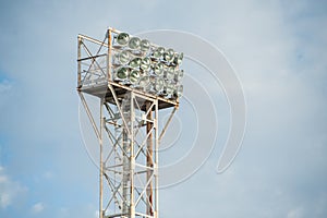 Floodlights over the field with clouds