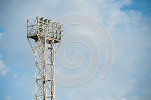 Floodlights over the field with clouds