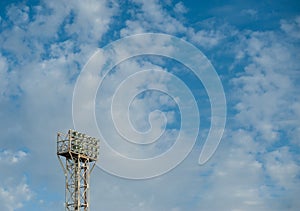 Floodlights over the field with clouds