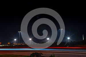 Floodlights at a soccer field at night..