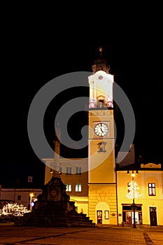 Floodlit clock tower in main square of Banska Bystrica Slovakia