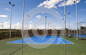 Floodlit tennis court