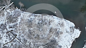 Floodplain river delta winter snow meander drone aerial inland video shot in sandy sand alluvium freezing cold frost