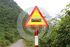 Warning road sign water floods, Phong Nha, Vietnam