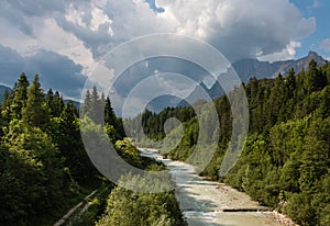 Floodwater running through valley in Dolomites