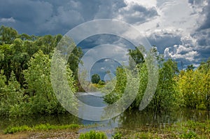 floodwaters. water overflowing as the result of a flood. High s