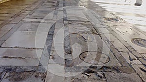 The floor of the ancient monumental cemetery in Pisa, Italy