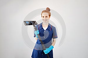 Floor care and cleaning services with vacuume cleaner at hotel room