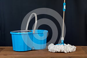 Floor cleaning with mob and bucket
