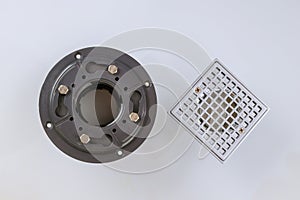 Floor drain from modern shower in cover is stainless steel, drain cover