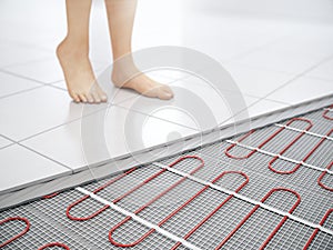Floor heating concept. Underfloor electric heating. Warm floor system