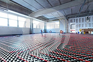 Floor heating in a new building. Interior design and finishing industry