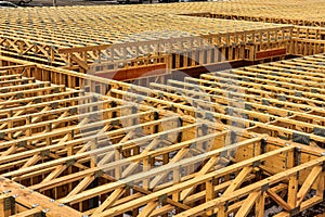 Floor joists installed on top of first floor.