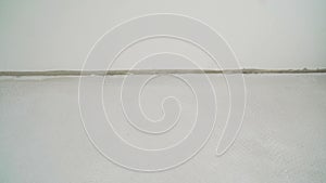 Floor leveling works. Fresh concrete floor of a construction site