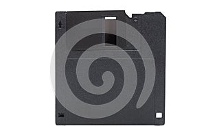 Floppy disk in a black square plastic case.
