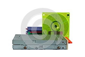 Floppy disk drive and diskettes on white background