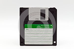 Floppy disk of 1.4 megabytes isolated on white background. Old storage disc for computer. photo