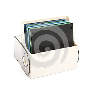 Floppy disk organizer case filled with diskettes, isolated photo