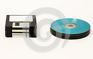 Floppy disks and CD / DVD - disk wheels on a white background