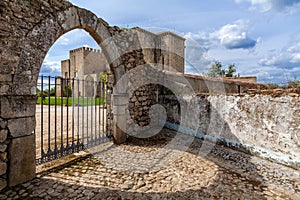Flor da Rosa Monastery in Crato seen through the gothic gate.