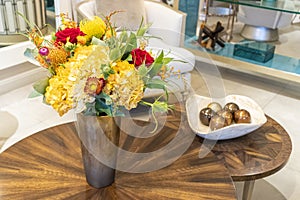 Floral arrangement of roses and carnations