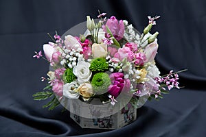 Floral arrangement with various spring flowers