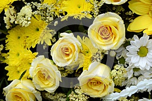 Floral arrangements in yellow tone.