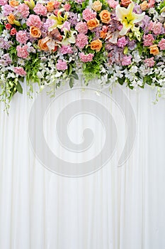 Floral backdrop in cozy room at the wedding
