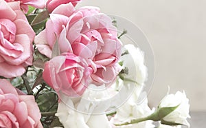 Floral background with bouquet of roses. Rectangular photo with flowers.