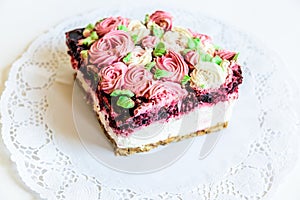 Floral cheesecake on white background