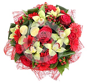 Floral compositions of red roses, red gerberas and orchids. Floristic composition, design a bouquet, floral arrangement. Isolated