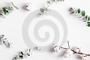 Floral concept with green leaves on white background top view mock-up